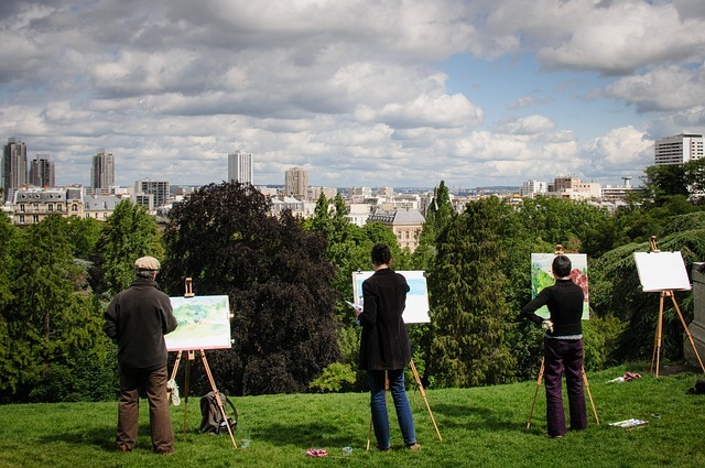 group of artists painting outdoors - Image by Gerhard Bögner